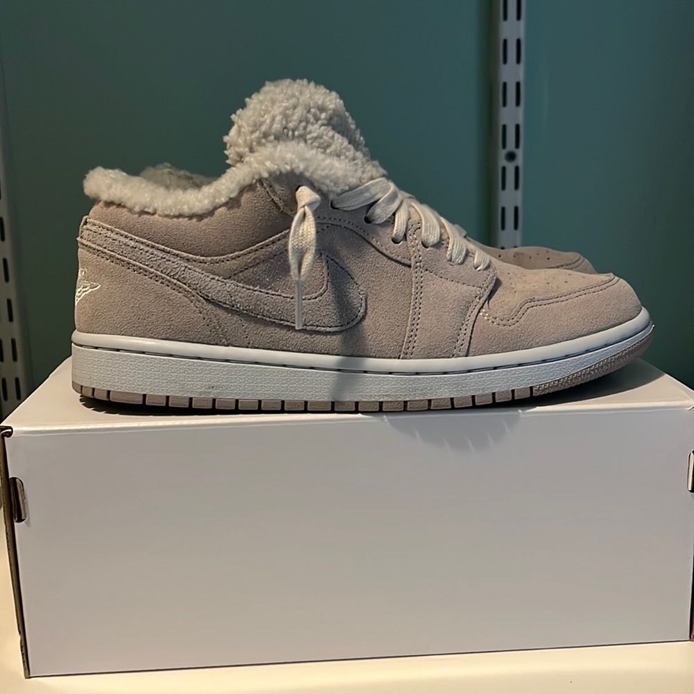 Women’s Air Jordan 1 Low Sherpa.  Size 9 with box.  Worn once.